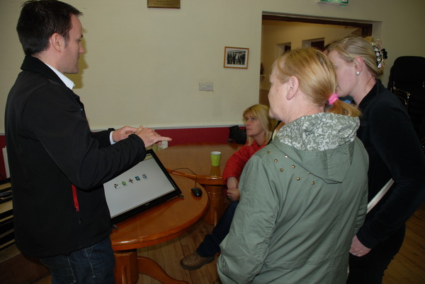 James Sweeney, Limerick City Council demonstrating DIEGO to a group of ladies in King's Island Youth and Community Centre
